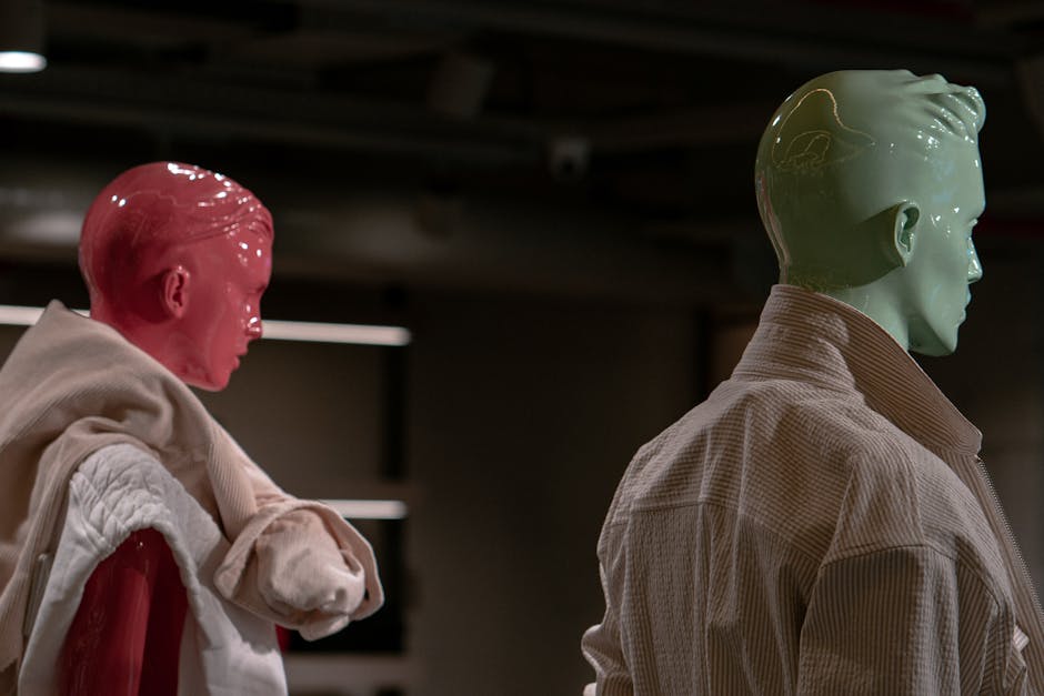 Colorful mannequins showcasing stylish clothing in an Istanbul store display.